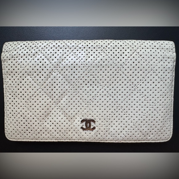 CHANEL Handbags - Chanel perforated leather wallet